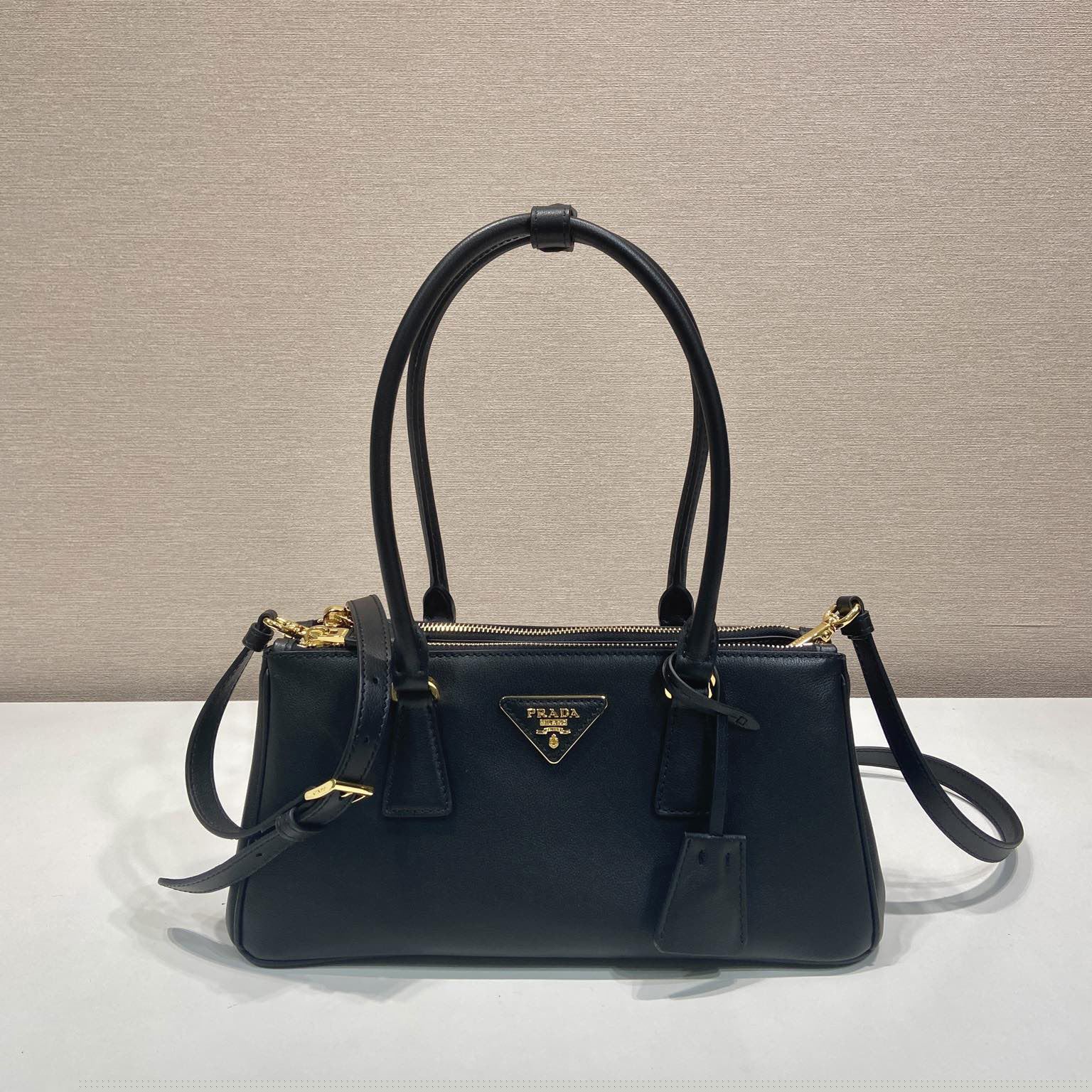 Pra*a top handle bags